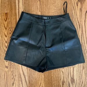 Misguided black pleather shorts